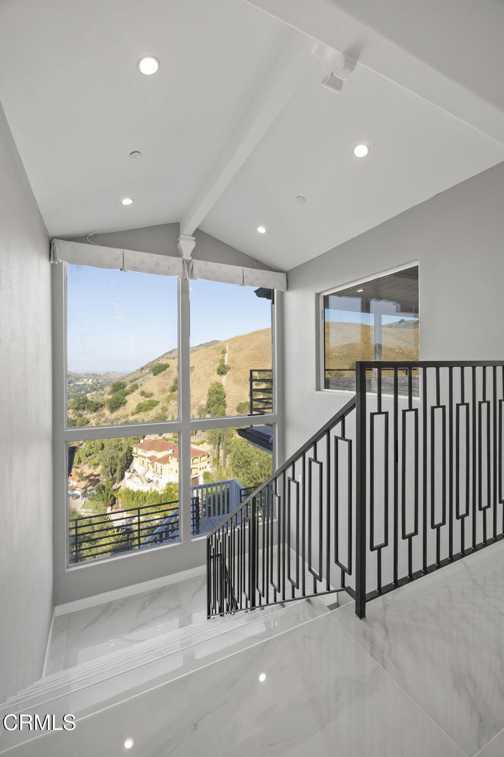 40 Saddlebow Road Bell Canyon, CA 91307 - Photo 33 of 70 a view of hallway with a large window