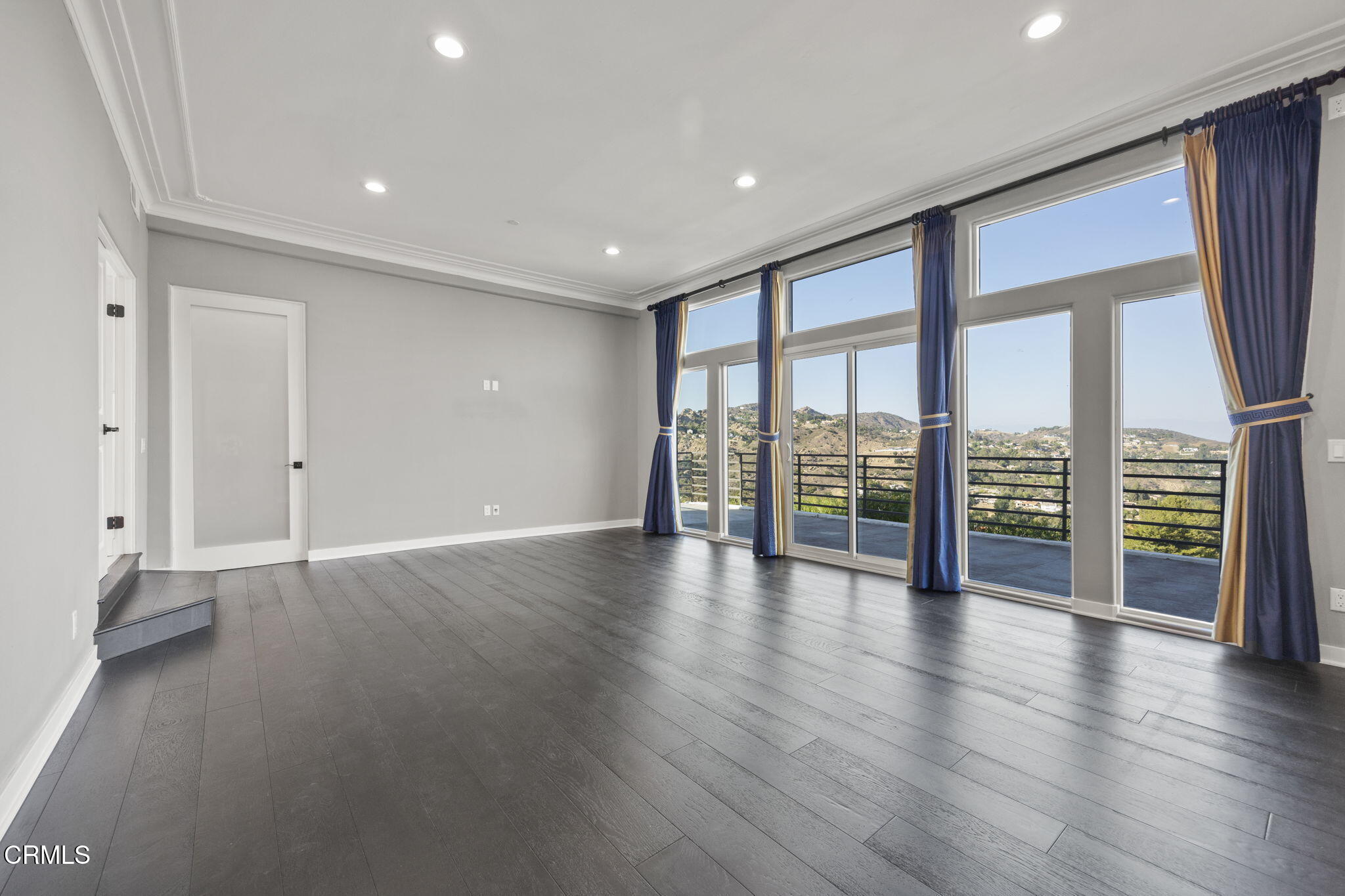 40 Saddlebow Road Bell Canyon, CA 91307 - Photo 35 of 70 an empty room with wooden floor and windows