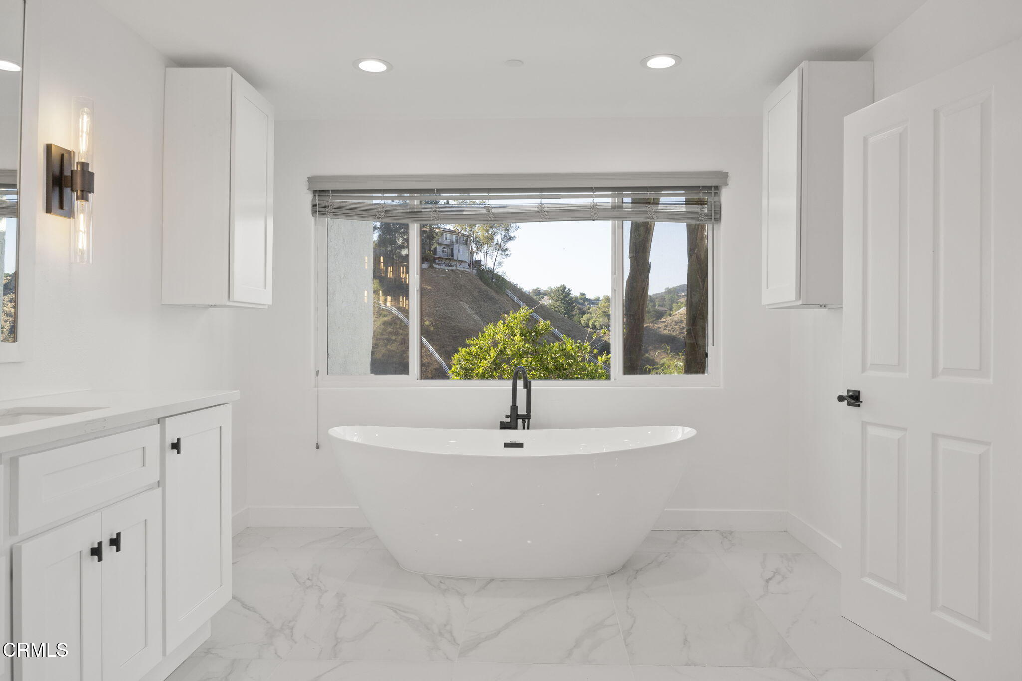 40 Saddlebow Road Bell Canyon, CA 91307 - Photo 38 of 70 a white bath tub sitting in a room
