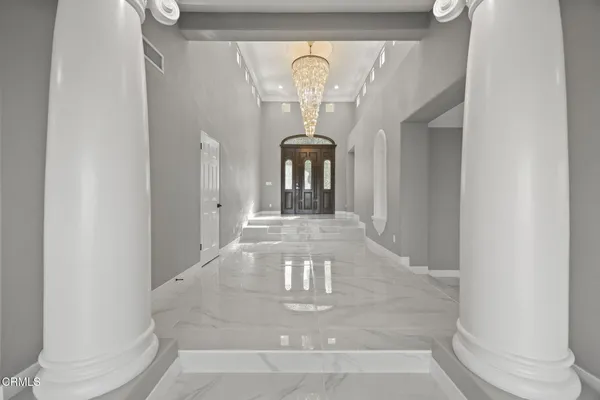 a view of a hallway with entryway