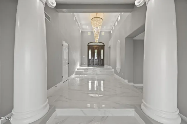 a view of a hallway with entryway