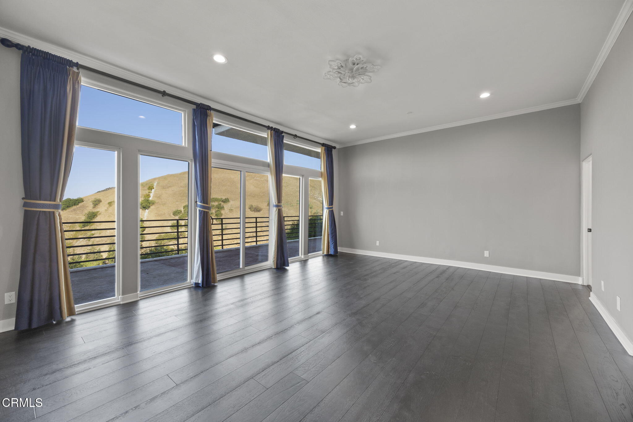 40 Saddlebow Road Bell Canyon, CA 91307 - Photo 44 of 70 an empty room with wooden floor and windows