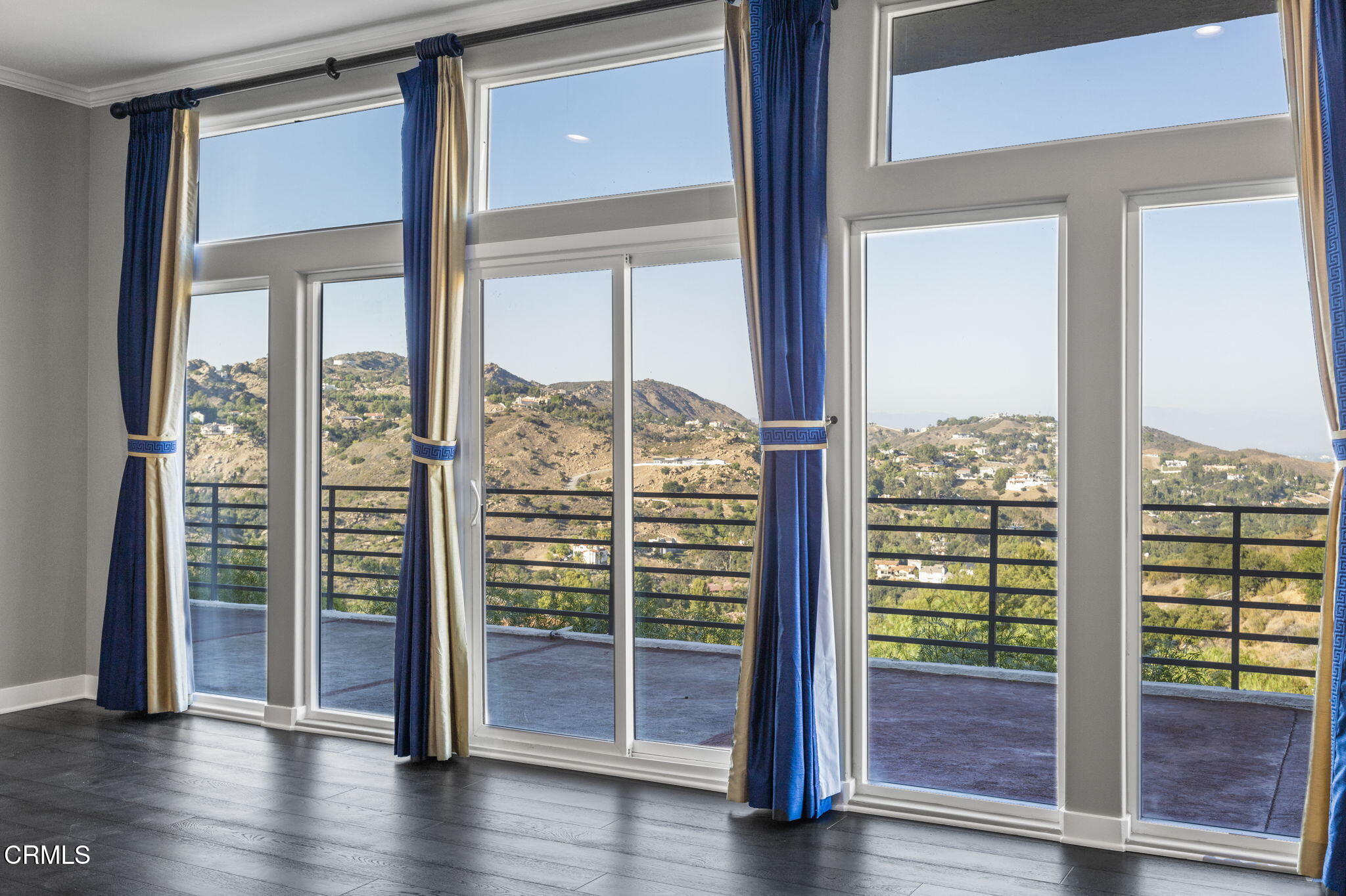 40 Saddlebow Road Bell Canyon, CA 91307 - Photo 45 of 70 a view of empty room with wooden floor and floor to ceiling window