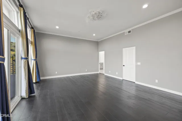 a view of balcony with furniture