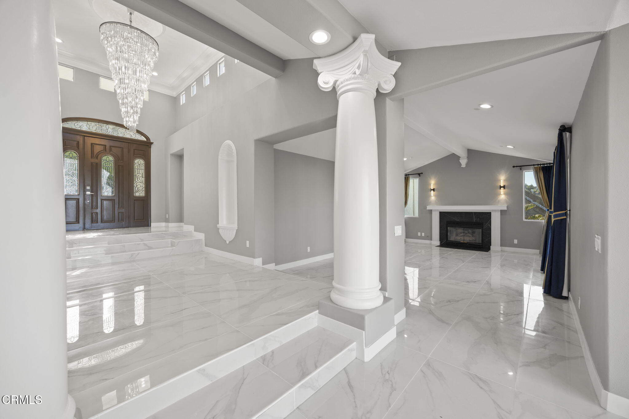 40 Saddlebow Road Bell Canyon, CA 91307 - Photo 5 of 70 a view of a hallway with chandelier and a chandelier