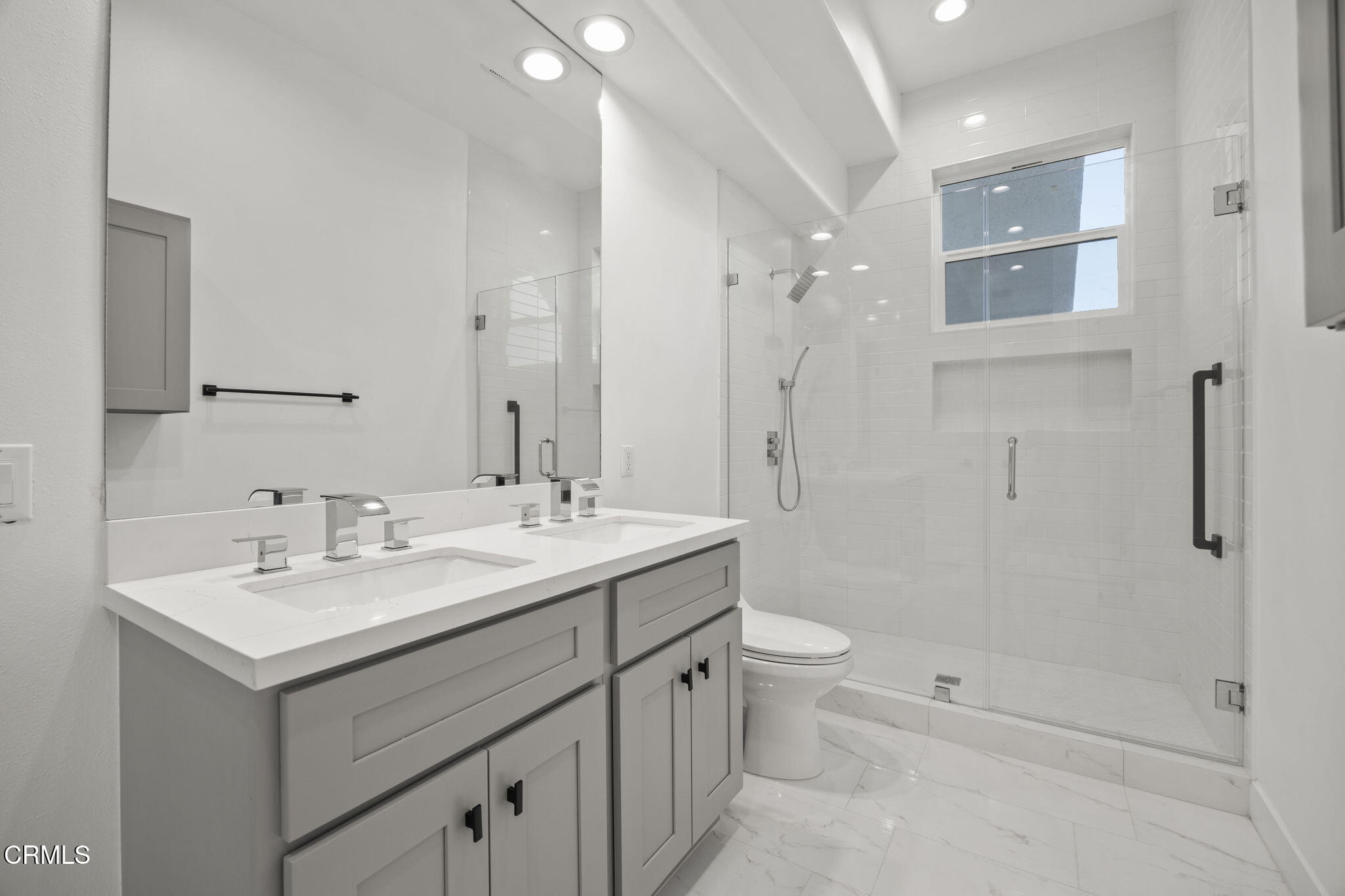 40 Saddlebow Road Bell Canyon, CA 91307 - Photo 52 of 70 a bathroom with a sink a toilet and shower