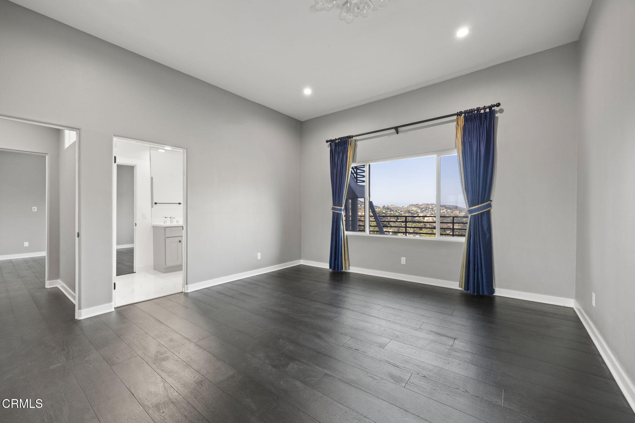 40 Saddlebow Road Bell Canyon, CA 91307 - Photo 53 of 70 a view of an empty room with wooden floor and a window