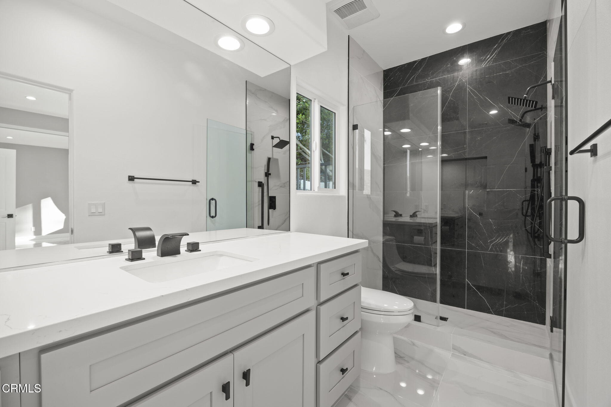 40 Saddlebow Road Bell Canyon, CA 91307 - Photo 55 of 70 a bathroom with double vanity sink toilet and shower
