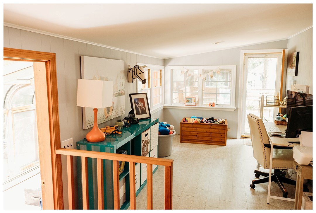 176 Arcadia Road Hopkinton, RI 02832 - Photo 35 of 41 Playroom/Den w/access to sunroom left and rear deck straight ahead