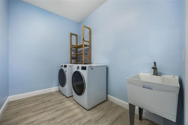 a utility room with dryer and washer