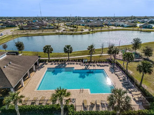 a view of a lake with a yard