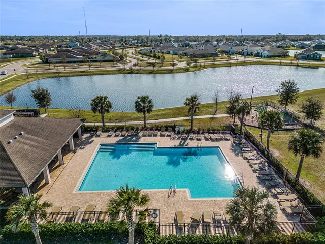 a view of a lake with a yard