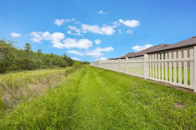a view of a lake from a yard