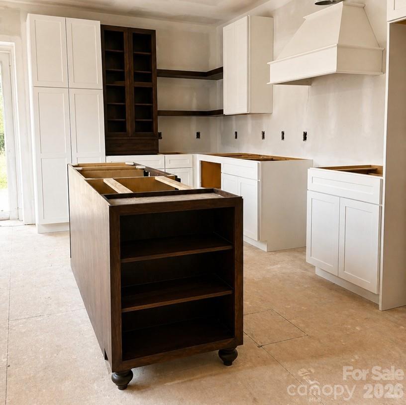 49354 Reeves Island Road Misenheimer, NC 28137 - Photo 2 of 6 a utility room with cabinets