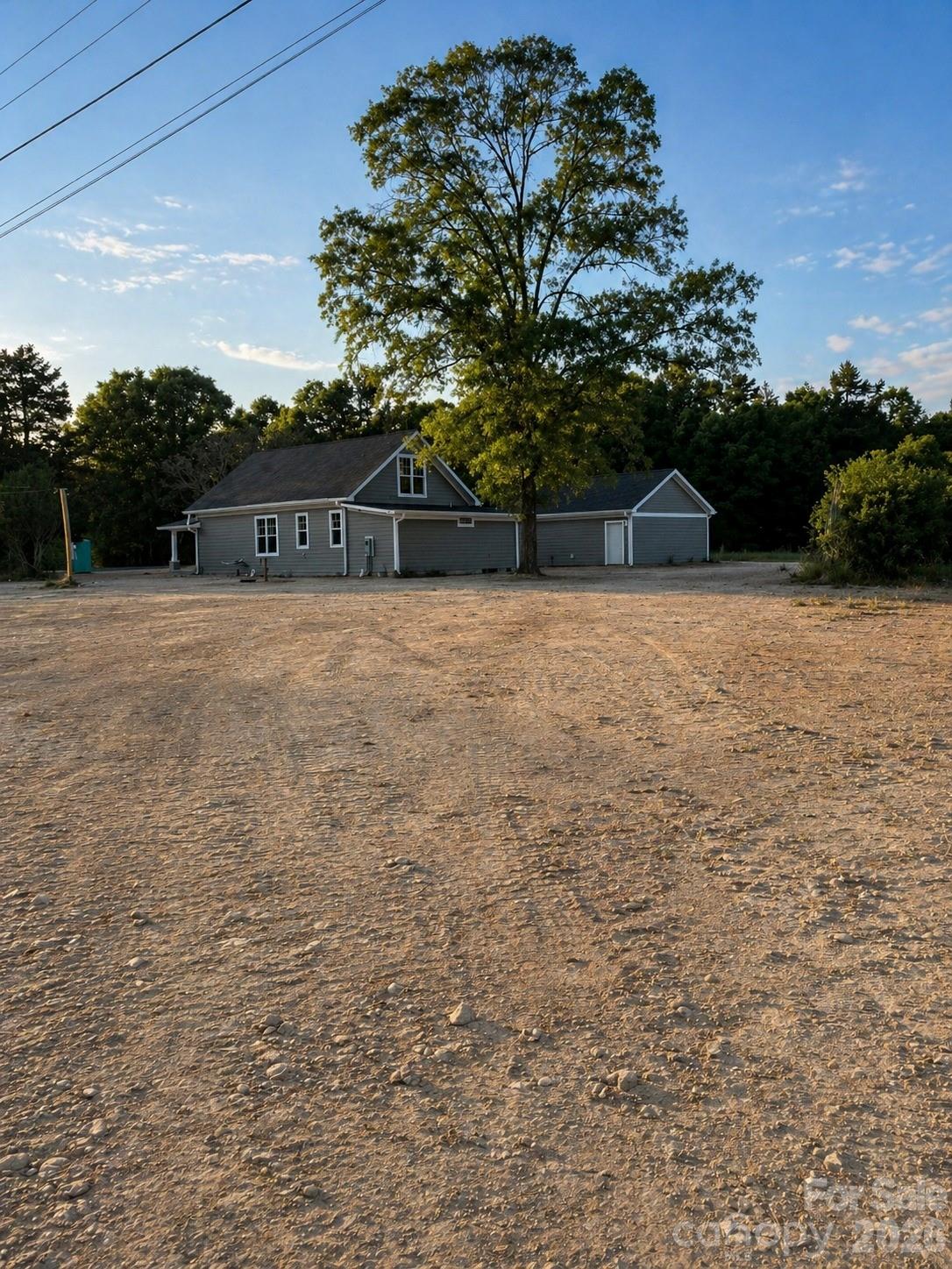49354 Reeves Island Road Misenheimer, NC 28137 - Photo 6 of 6 a front view of a house with a yard