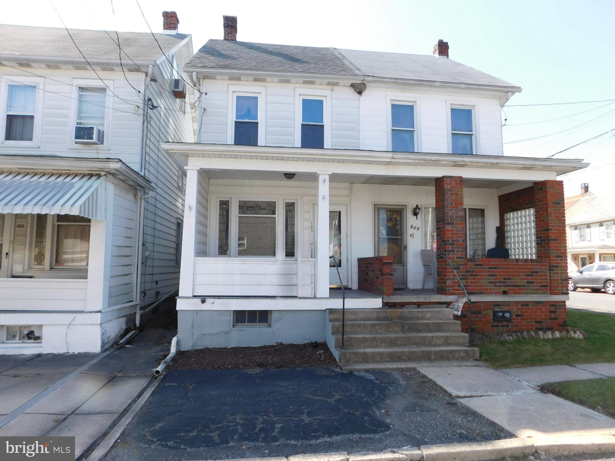 103 East Amidon Street Summit Hill, PA 18250 - Photo 1 of 16 a view of a building with a bench