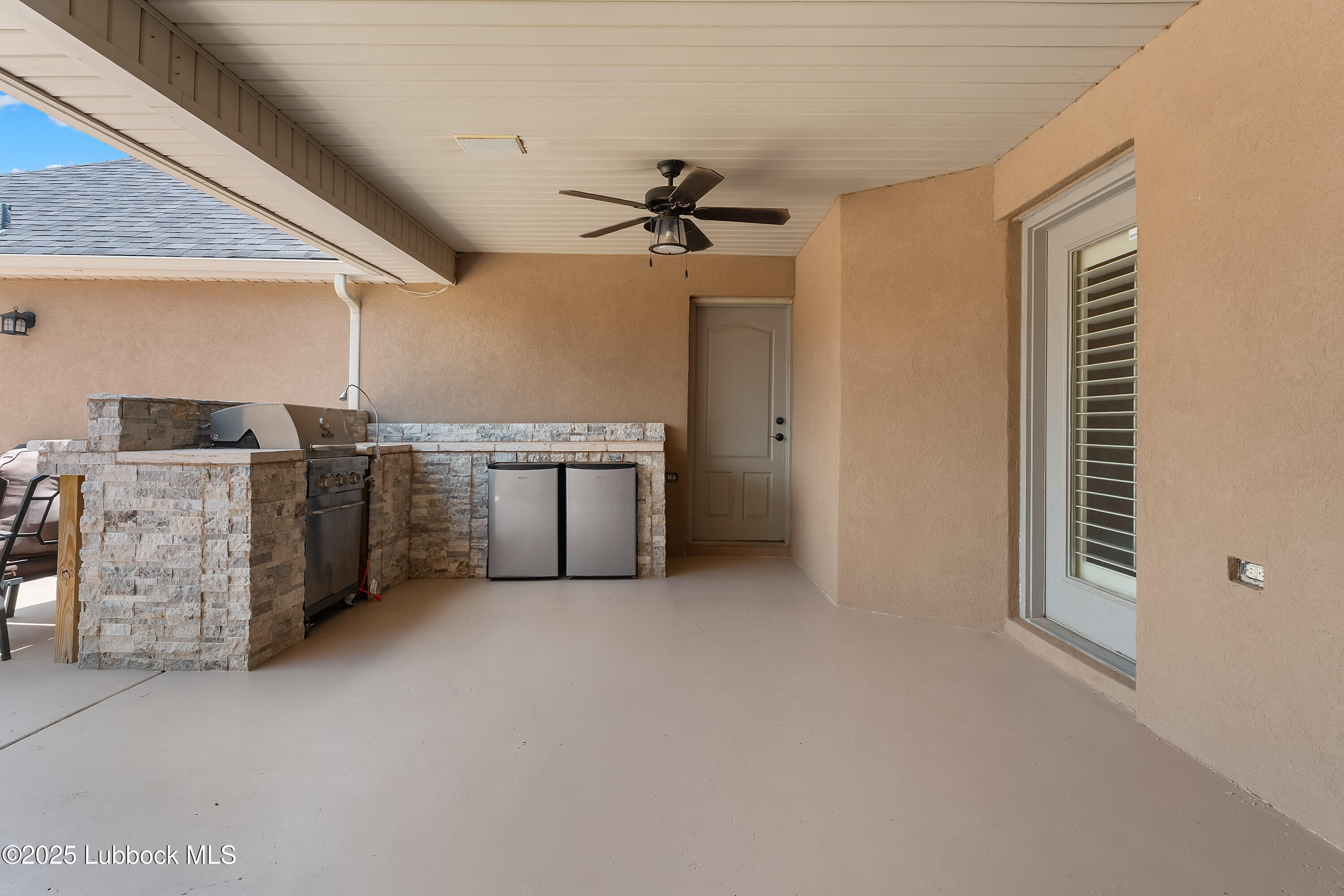 3902 101st Street Lubbock, TX 79423 - Photo 37 of 37 an empty room with kitchen view