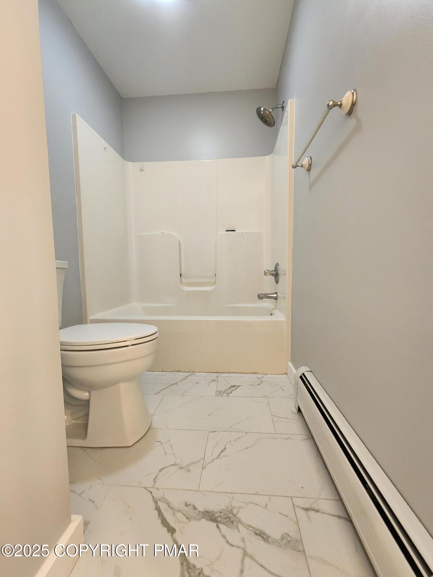 283 Pocono Boulevard Bushkill, PA 18324 - Photo 38 of 44 a bathroom with a toilet and a shower