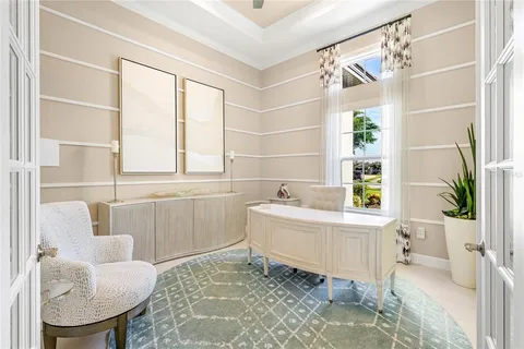 a bedroom with a bed and a mirror