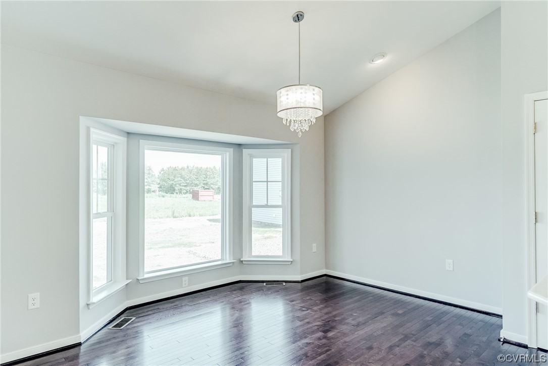 Tbd Rockahock Road Lanexa, VA 23089 - Photo 11 of 26 a view of an empty room with wooden floor and a window