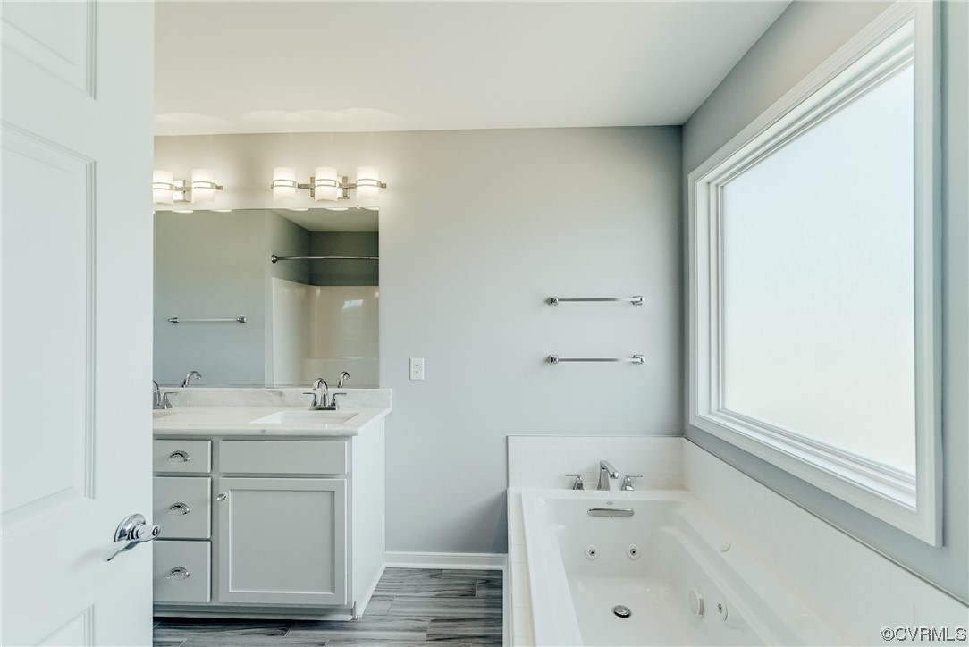 Tbd Rockahock Road Lanexa, VA 23089 - Photo 16 of 26 a bathroom with a sink vanity and a mirror