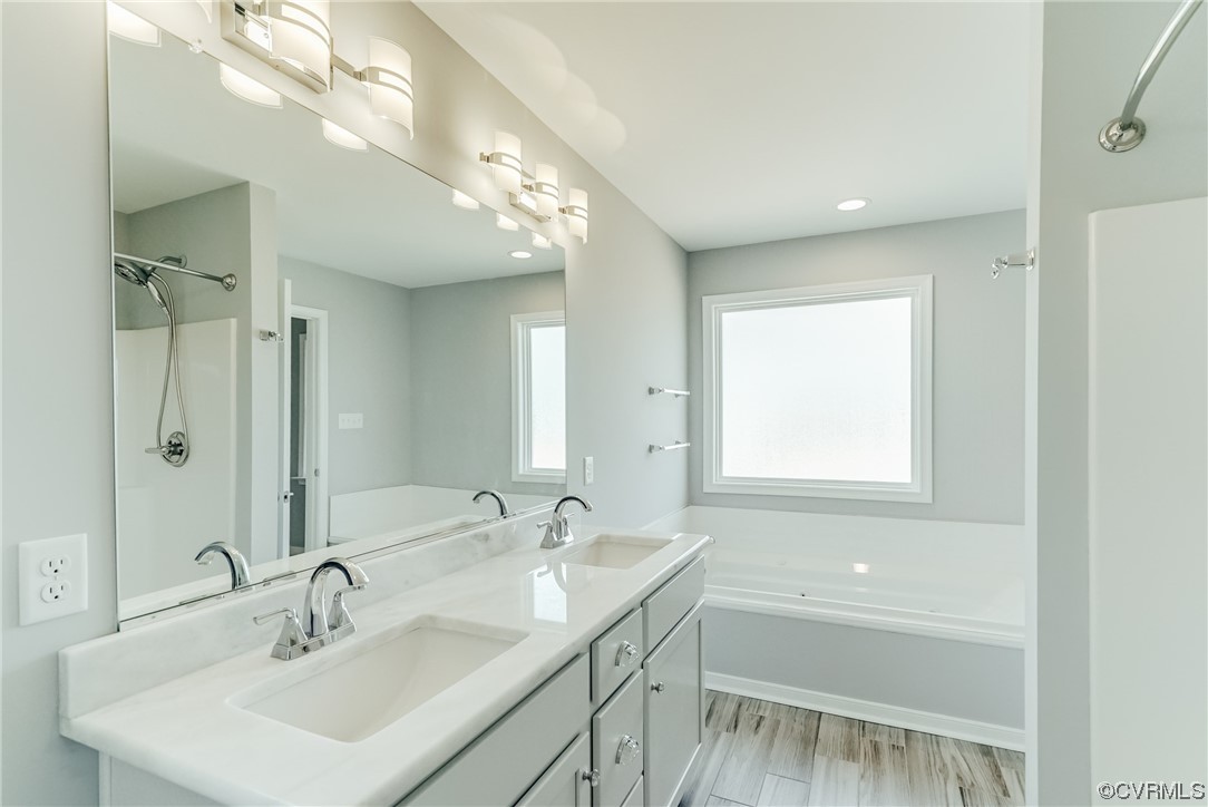 Tbd Rockahock Road Lanexa, VA 23089 - Photo 17 of 26 a bathroom with a sink double vanity granite tub shower and a mirror