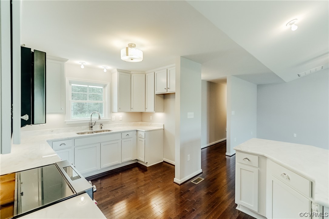 Tbd Rockahock Road Lanexa, VA 23089 - Photo 5 of 26 a kitchen with white cabinets and sink