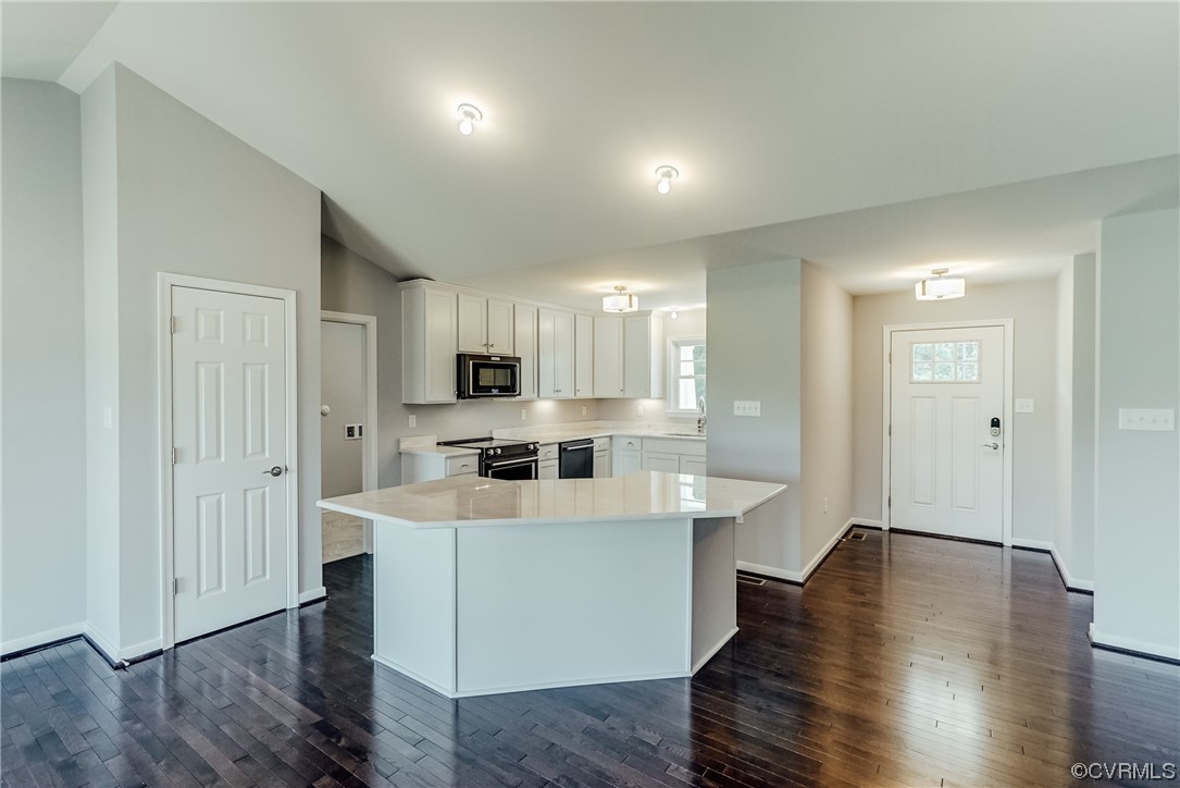 Tbd Rockahock Road Lanexa, VA 23089 - Photo 7 of 26 a open kitchen with white cabinets and wooden floor