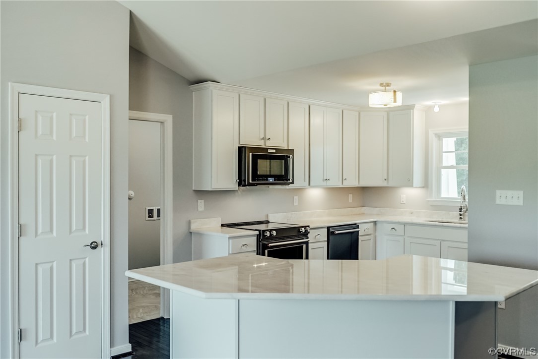 Tbd Rockahock Road Lanexa, VA 23089 - Photo 9 of 26 a kitchen with stainless steel appliances granite countertop a refrigerator a stove a sink and white cabinets