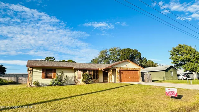a view of a house with a outdoor space