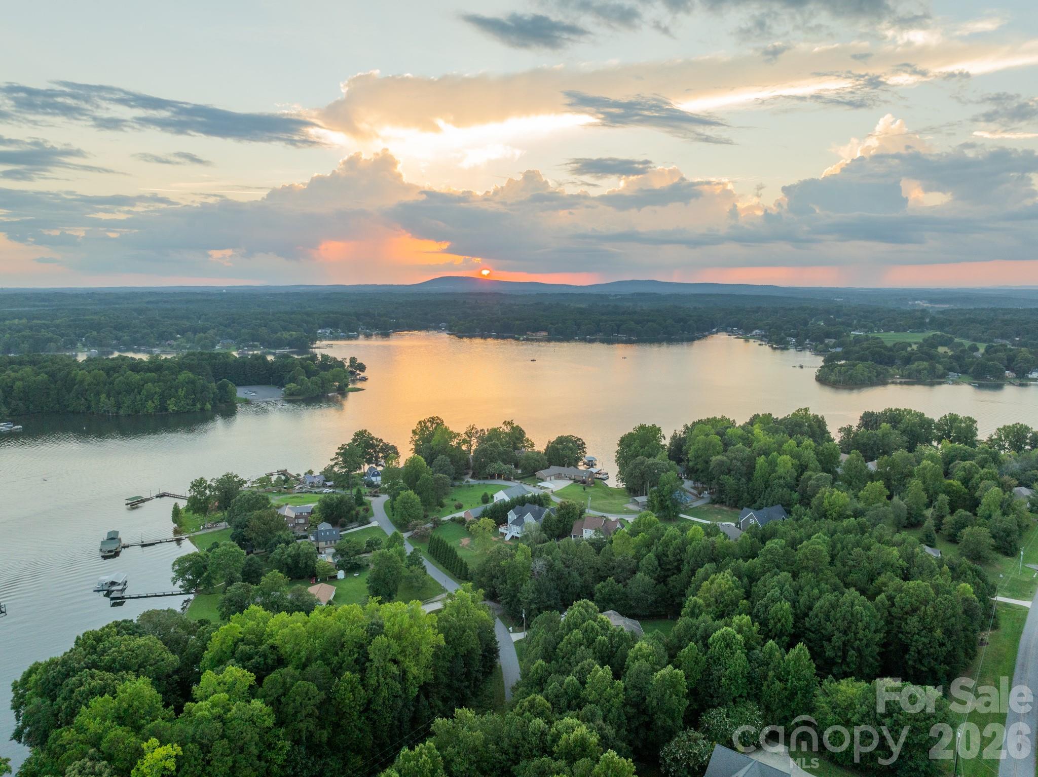7545 Rabbit Circle Denver, NC 28037 - Photo 2 of 37 a view of a lake with houses in back
