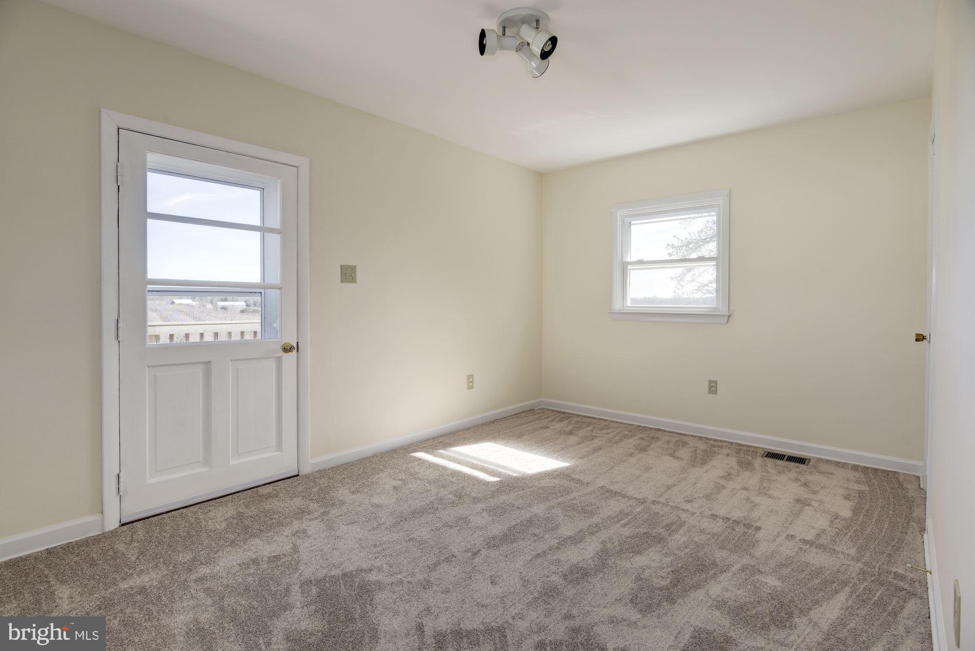 2981 Florence Road Woodbine, MD 21797 - Photo 14 of 27 Master Bedroom with door to deck