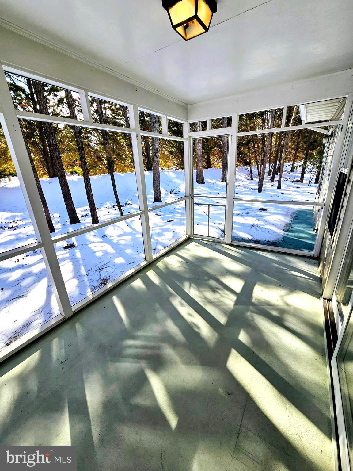 44045 Fieldstone Way California, MD 20619 - Photo 35 of 37 Screened porch