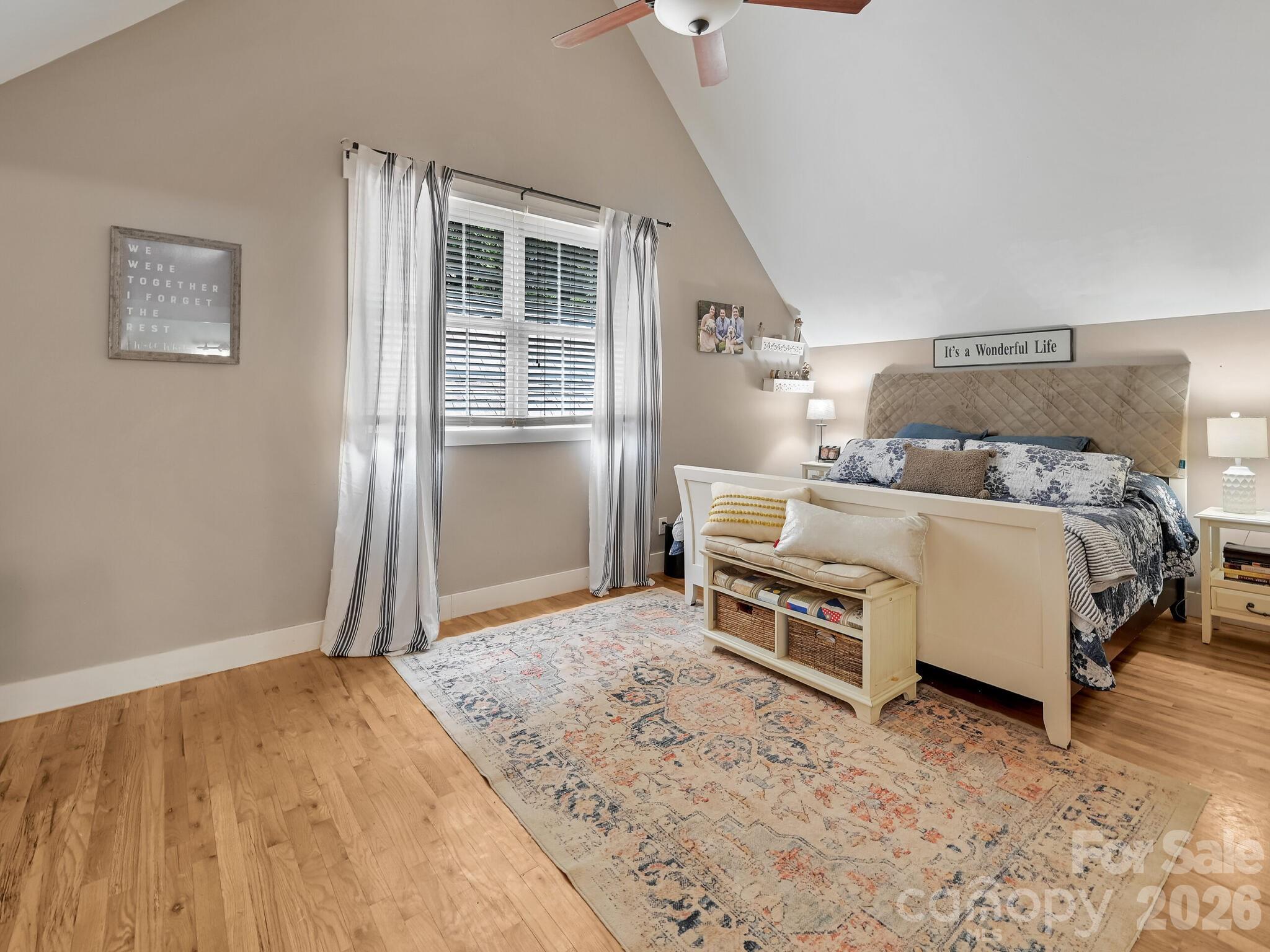 1645 Ivy Hill Road Marshall, NC 28753 - Photo 19 of 36 a bedroom with a bed and a window