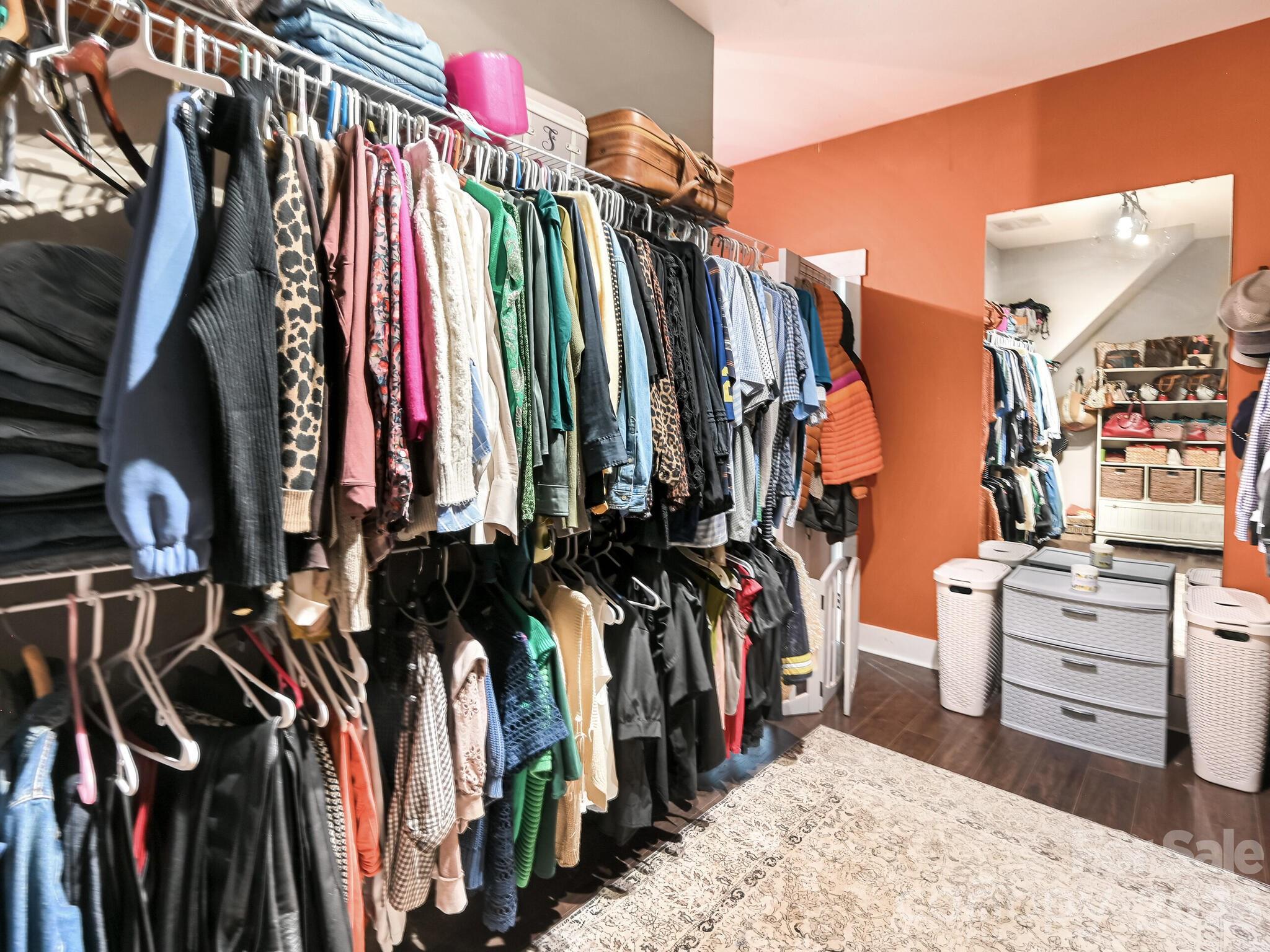 1645 Ivy Hill Road Marshall, NC 28753 - Photo 23 of 36 a view of walk in closet with clothes