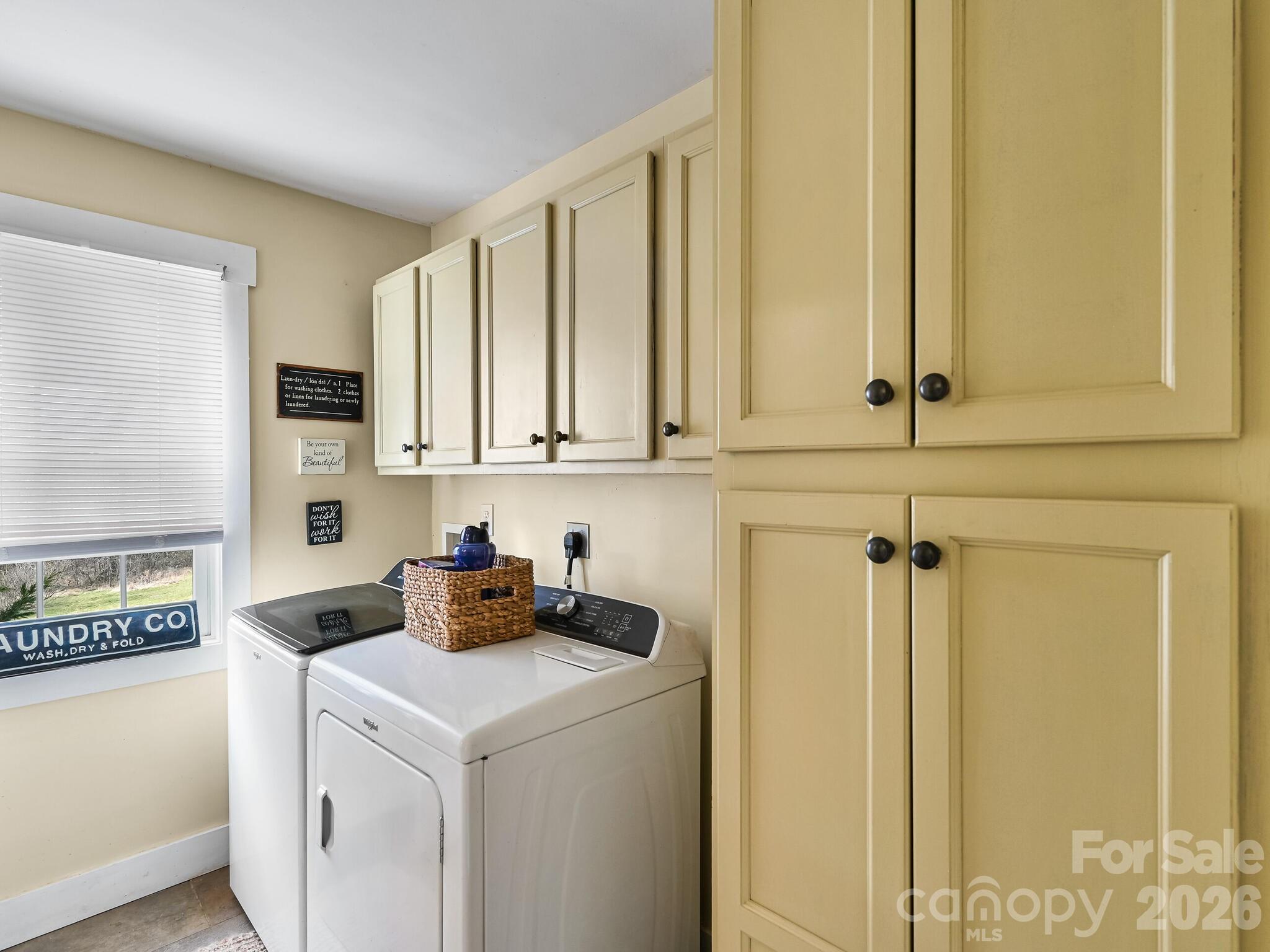 1645 Ivy Hill Road Marshall, NC 28753 - Photo 28 of 36 a view of a kitchen with white cabinets