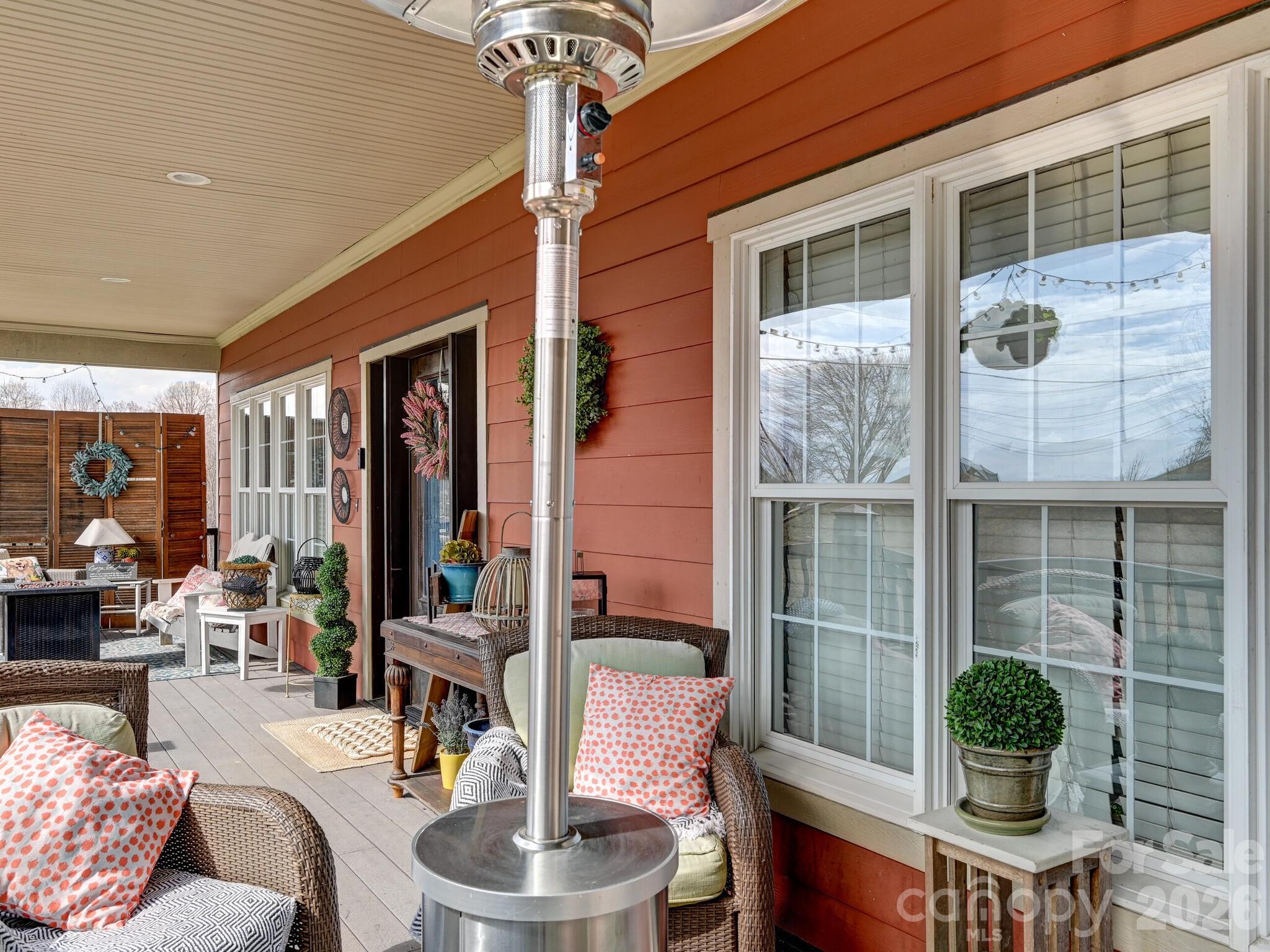 1645 Ivy Hill Road Marshall, NC 28753 - Photo 4 of 36 a living room with furniture and a potted plant