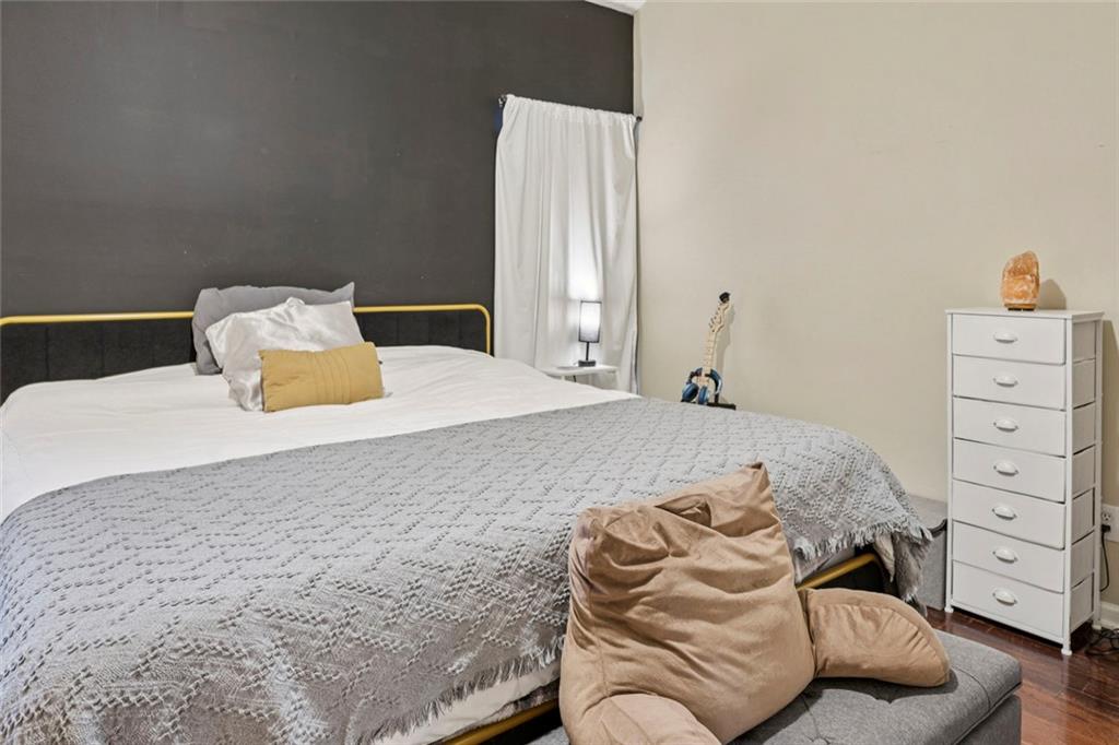 1257 Gates Circle Southeast Atlanta, GA 30316 - Photo 16 of 26 a bedroom with a bed and closet