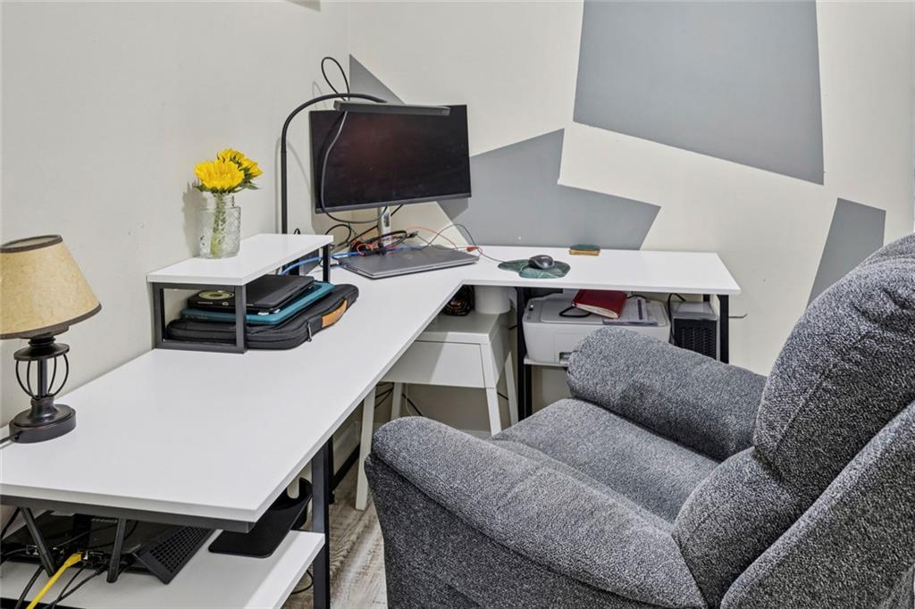 1257 Gates Circle Southeast Atlanta, GA 30316 - Photo 21 of 26 a living room with furniture and a mirror