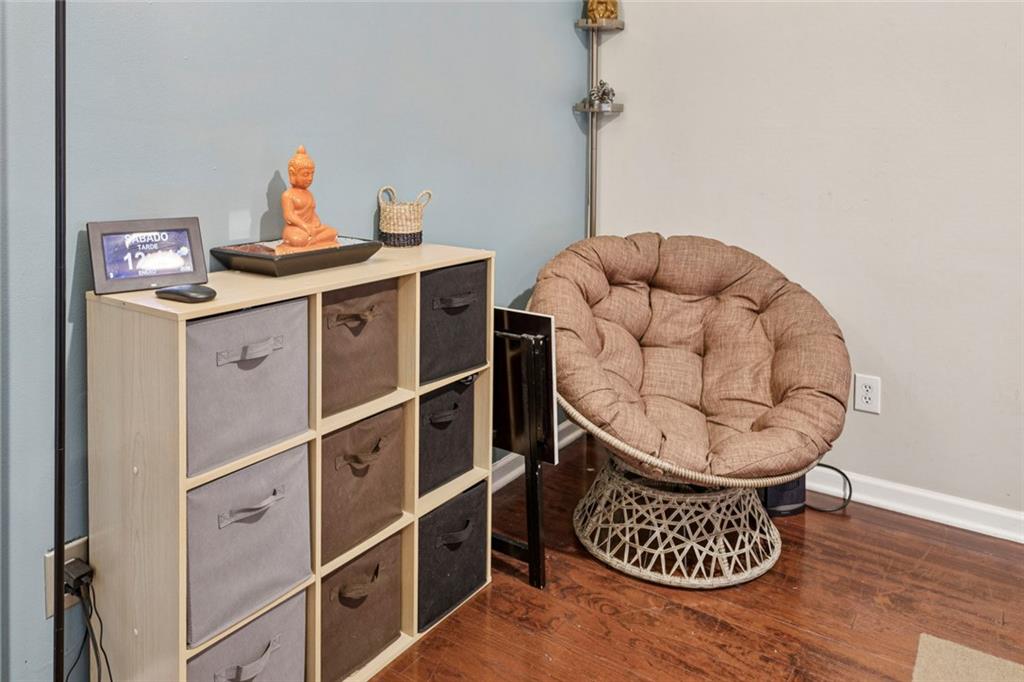 1257 Gates Circle Southeast Atlanta, GA 30316 - Photo 3 of 26 a room with furniture a wooden floor and window