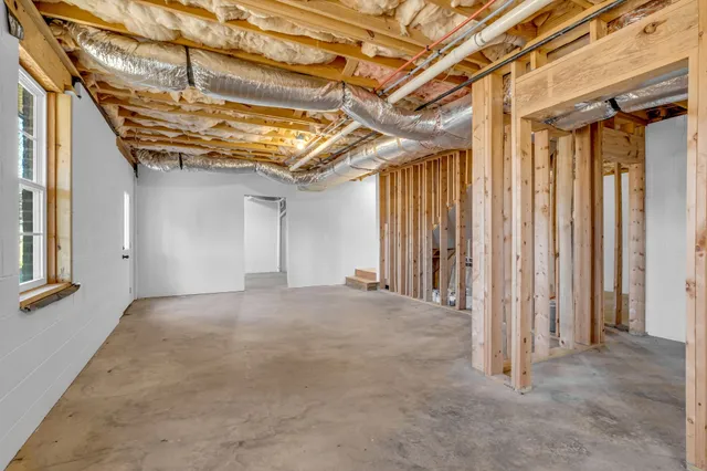 a view of a park that has a sign board