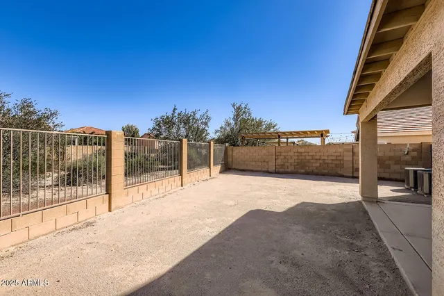 a view of balcony with two room with wooden floor