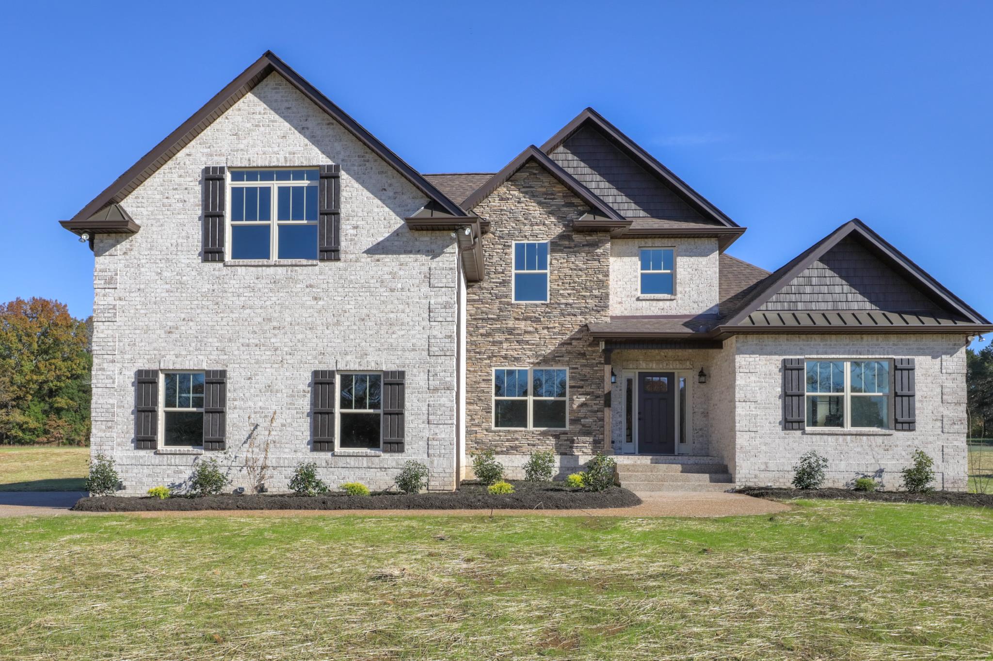 2219 Cairo Bend Road Lebanon, TN 37087 - Photo 1 of 30 a front view of a house with a yard