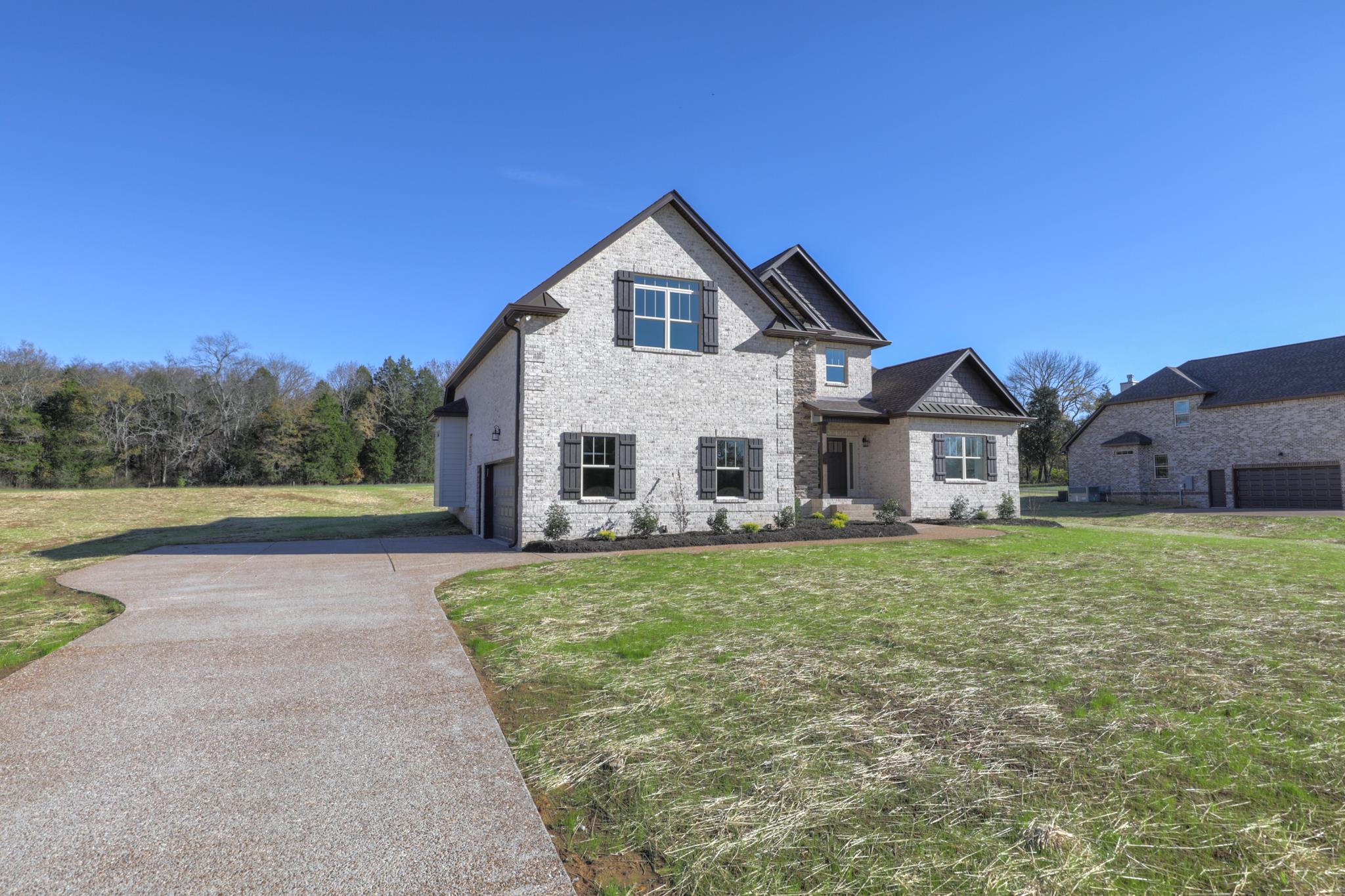 2219 Cairo Bend Road Lebanon, TN 37087 - Photo 2 of 30 a view of a house with a yard