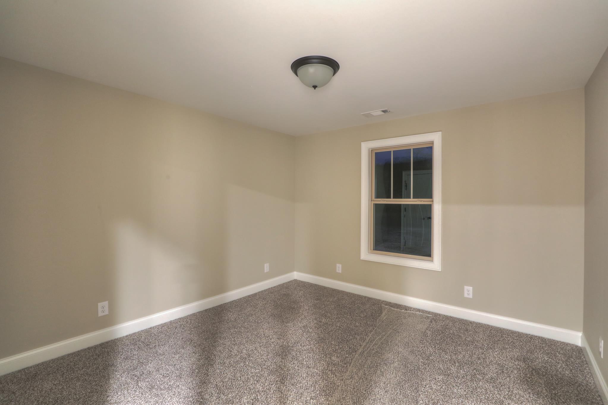 2219 Cairo Bend Road Lebanon, TN 37087 - Photo 27 of 30 a view of an empty room with a window