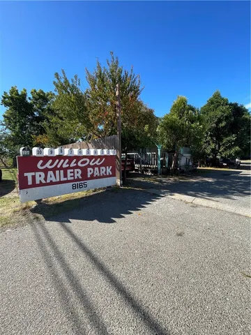 a view of swimming pool with a yard