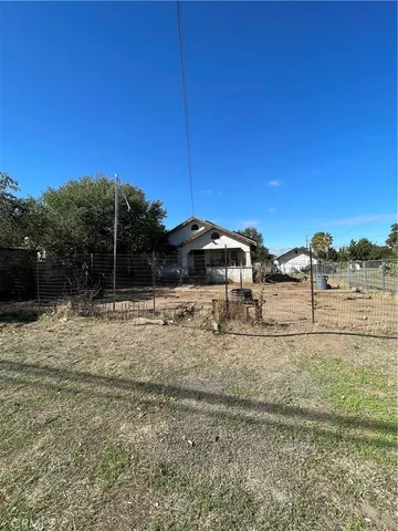 a view of a yard with an outdoor space