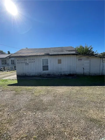 a view of a backyard with a house
