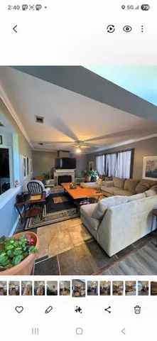 a swimming pool view with a sitting space