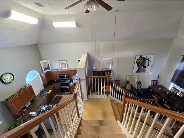a view of a workspace with furniture and toys